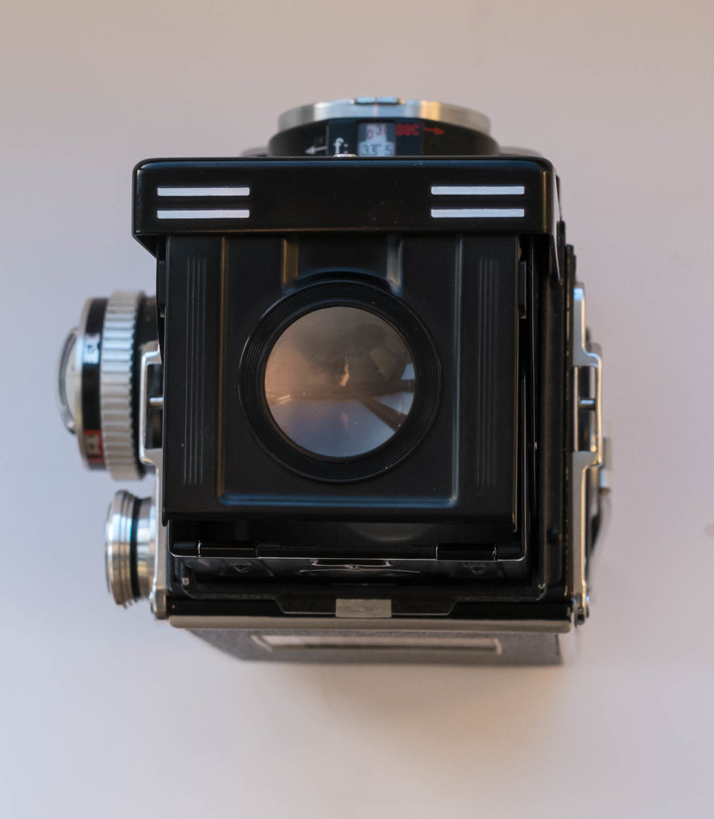 The pop-up magnifier, which can be used to aid focus. I have used it a few times, but I am always tempted to go back to normal view for framing afterwards because I wear glasses.